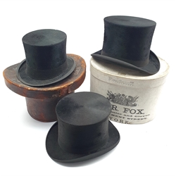 Black top hat by Hyam & Co Leeds, another in a Victorian leather hat box and another by Christy's London in a cardboard box inscribed 'M.R.Fox York'