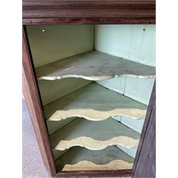 Oak corner cupboard with three fixed shelves 