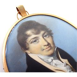 George Engleheart (British 1752-1829)
Portrait miniature upon ivory
Head and shoulder portrait of a gentleman with dark curling hair, wearing a black coat
Initialled 
Within gilt frame with blue enamel and gilt Masonic emblems to centre verso 
Oval 8.5cm x 7cm 

George Engleheart studied at the Royal Academy Schools from 1769 under Sir Joshua Reynolds and George Barret, and regularly exhibited work at the Royal Academy between the years 1773 and 1822. He was appointed as Miniature Painter to King George III and is known to have painted at least twenty five portraits of the King, as well as a number of others depicting various members of the Royal family. Engleheart is known for his decorative style and flattering depictions, an approach which saw him gain an excellent reputation with sitters. Today he is widely regarded as one of the most eminent portrait miniaturists of the late Georgian period.