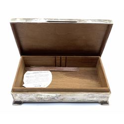 Silver rectangular cigarette box with engine turned cover and bracket feet L17cm Birmingham 1950 Maker Harman Bros.