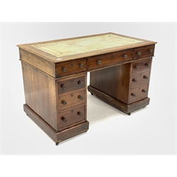Victorian mahogany twin pedestal desk, the top inset with tooled leather writing surface over three frieze drawers, the two pedestals each housing three graduated drawers, raised on castors, 120cm x 70cm, H75cm
