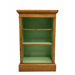 Pollard Oak Open Bookcase, the cross banded top with rosewood band, green painted interior with two adjustable shelves, raised on a skirted base W62cm, H97cm, D31cm