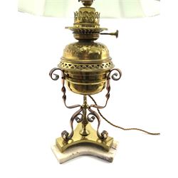 Arts and Crafts style copper and brass oil lamp base, having spiral twist supports on trifom base and marble plinth, with matched brass reservoir, converted to electric, H29cm (excluding reservoir)