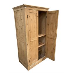 Pine wardrobe, two doors opening to reveal hanging rail and three fixed shelves W99cm, H194cm, D66cm 