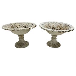 Pair white painted cast iron bowl shaped garden urns, moulded bowl on globular stem and circular moulded foot