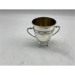 Silver vase shape pepperette or small caster H12cm Chester 1910, silver two handled sugar bowl Birmingham 1922 and four silver commemorative dishes 15oz (6)