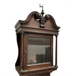 Empty oak longcase  - with a deep swans neck pediment, turned finial and carved detail, square hood door with pilasters and wavy back splats, trunk with canted three quarter columns and wavy topped door, plinth on bracket feet. 13