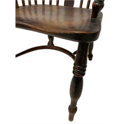 F Walker Rockley -19th century Windsor armchair, the spindle and splat back over elm seat, raised on turned supports united by crinoline stretcher - stamped