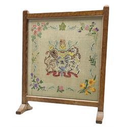 'Oakleafman' oak fire screen, with needlework panel for the coronation of Queen Elizabeth II 1953, carved with oakleaf signature, by David Langstaff of Easingwold, W51cm, H63cm