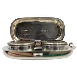 Edwardian silver double sovereign case, of plain oval form with suspension loop, by Dennison Watch Case Co, Birmingham 1910, L6cm
