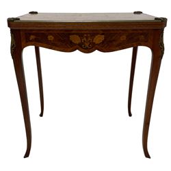 Mid-20th century Kingwood and rosewood card or games table, the rectangular top with rounded corners inlaid with shaped panels and extending floral decoration, swivel and folding action revealing baize lined playing surface, decorated with cast metal corner cartouches and brass mouldings, fitted with single end drawer, shaped frieze rails with further inlay, on cabriole supports 
