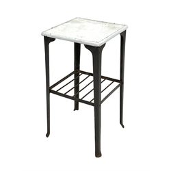 20th century industrial cast and wrought metal lamp table, the square enamel top raised on four supports united by under tier 
