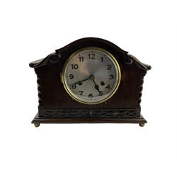 1930s striking mantle clock in a oak case.