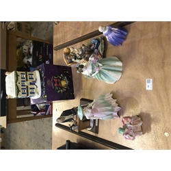 Three Royal Doulton Figurines of Ladies,a Coalport figure of a lady,Two Figurines and a Ringtons Tealight House