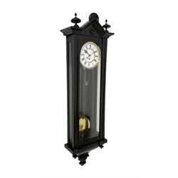 German - late 19th century single weight Vienna regulator, in an ebonised case with a gable pediment and finials, fully glazed door with a visible pendulum and two part enamel dial with Roman numerals and steel spade hands, 8-day movement with a  weight driven deadbeat escapement. No weight.