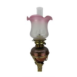 Brass oil lamp with Corinthian column, embossed reservoir and etched glass shade H78cm overall