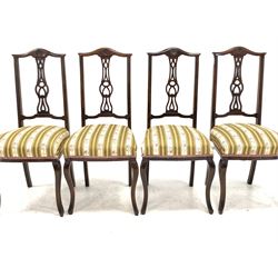 Set four Edwardian bedroom chairs with upholstered seats, raised on slender shaped front supports 