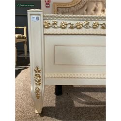 Barnini Oseo - super king 6' 'Reggenza' bedstead, the headboard with a pierced cartouche pediment with extending scrolling foliage, decorated with trailing gilt flower heads, upholstered in buttoned lilac velvet, raised on cabriole feet, in a cream finish