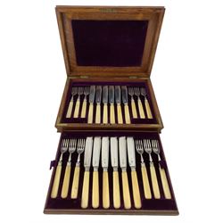 Set of twelve Edwardian silver bladed fish knives and forks with ivorine handles in oak case Sheffield 1906 Maker James Dixon & Sons Ltd 