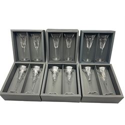 Six Waterford Millennium Collection pairs of flutes comprising two sets of Health, Love, two sets of Happiness and Prosperity, all boxed