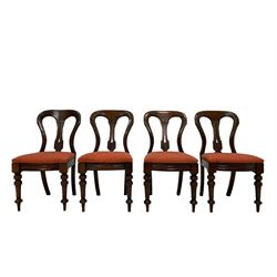Victorian set twelve mahogany dining chairs, shaped balloon back with pierced splat carved with geometric design, drop on upholstered seat, curved and moulded front rail on turned front supports