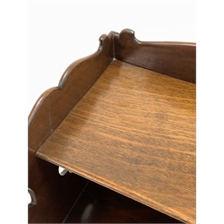 Edwardian mahogany bedside table, the raised, shaped and pierced back with open shelf over one drawer, shaped apron, raised on cabriole supports