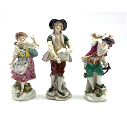 Pair of 19th Century Samson figures of a hunter with a crossbow and his female companion, gold anchor mark H13cm and a Naples figure carrying a jar H16cm