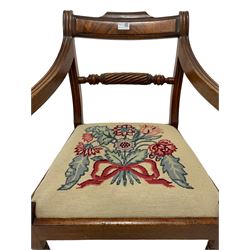 Regency mahogany elbow chair, rope-twist centre rail flanked by scrolled arm terminals, drop-in seat upholstered in floral tapestry fabric, raised on ring turned supports