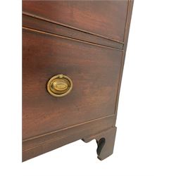 George III mahogany low chest-on-chest, fitted with two short over four long graduating drawers with cock-beaded facias and bone escutcheons, each with pressed brass handle plates and reeded ring handles, raised on shaped bracket feet