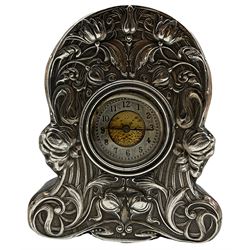 Leather and silver mounted timepiece of Art Nouveau design with raised pattern of stylised flowers and leaves H16cm Birmingham 1903 Maker William Devenport  