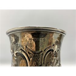 Victorian silver challenge cup presented by The West Yorkshire Rifle Volunteers with inscription and embossed decoration on pedestal foot H18cm London 1870 Maker Robert Harper and a smaller challenge cup without inscription H14cm 1871 11.7oz 