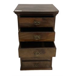 Pair of late Victorian and later figured mahogany pedestal chests, each fitted with six drawers