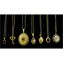 Seven 9ct gold pendant necklaces including garnet, pearl and enamel