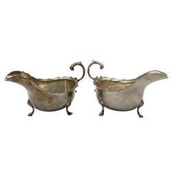 Pair of Georgian design silver sauceboats with crimped rims, 'C' scroll handles and shaped supports London 1912/13 Maker Horace Woodward & Co 