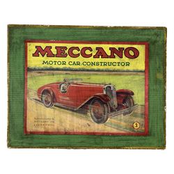 Meccano No. 1 Motor Car Constructor, unbuilt with cream body, red roof, mudguards and interior, boxed with instructions, not complete, 29 pieces in total 