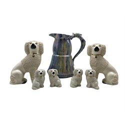 Royal Winton 'Ronda' pattern jug and six Victorian style poodles 