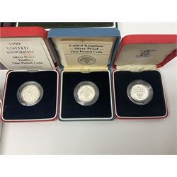 Commemorative coins and medallions including The Royal Mint United Kingdom 2005 '200th Anniversary Trafalgar' silver proof piedfort two coin set, 2020 'The Brexit Silver 1oz Commemorative', three St Helena one ounce fine silver coins from 'The Queen's Virtues' collection produced for 'The East India Company London, four United Kingdom silver proof one pound coins etc, mostly cased with certificates