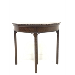 Chippendale style demi lune card table, fold over top revealing baize lined playing surface over beaded moulding, raised on four carved and chamfered square supports, W84cm