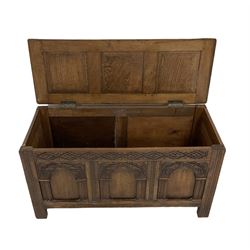 20th century oak coffer, the hinged lifting lid over three panelled base, raised on stile supports 
