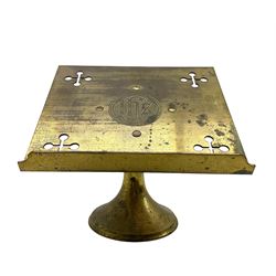 Early 20th century Gothic style brass altar lectern, the rectangular book support centrally engraved 'IHS' with pierced decoration to each corner, inscription 'In Loving Memory of Mary Doughty Caster 1937', H20.5cm