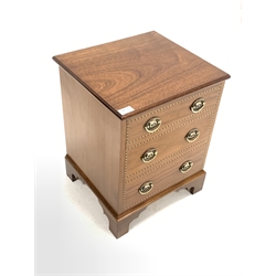 20th century Georgian style mahogany storage box, the hinged lid over three faux drawer front with chequered inlay and brass plate pull handles, raised on shaped bracket supports 