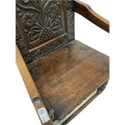 19th century oak wainscot chair, the triple arched cresting rail over floral carved back panel over plain seat, raised on turned supports 