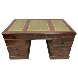 George III design mahogany twin pedestal desk, rectangular top with three leather inset writing surfaces, fitted with eight cockbeaded drawers, raised on two plinth bases