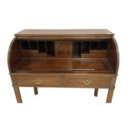 George III mahogany roll-top bureau, the tambour roll encosing sliding writing surface and fitted interior with pigeonholes and correspondence drawers, over two cock-beaded drawers, on square supports with inner chamfer