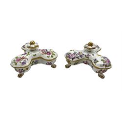 Pair of Hochst spice pots and covers each of lobed design with three divisions decorated with floral sprays on paw feet W12cm