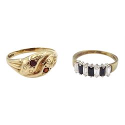 Gold garnet crossover snake ring, Birmingham 1951 and a gold cubic zirconia ring, both hallmarked 9ct