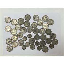 Approximately 500 grams of pre 1947 Great British silver coins, including halfcrowns, florin and one shillings