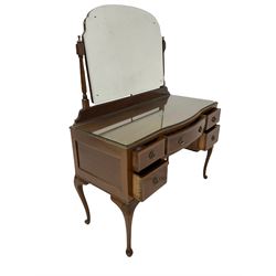 Edwardian mahogany mirror back dressing chest, the adjustable mirror over one long and four small drawers, raised on cabriole supports 