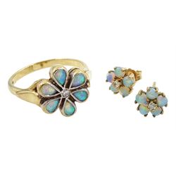 Gold opal and diamond flower design ring and pair of matching earrings, both hallmarked 9ct
