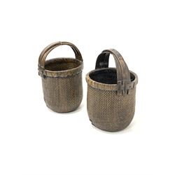 Pair of cane work baskets of cylindrical form with bentwood carry handles H62cm